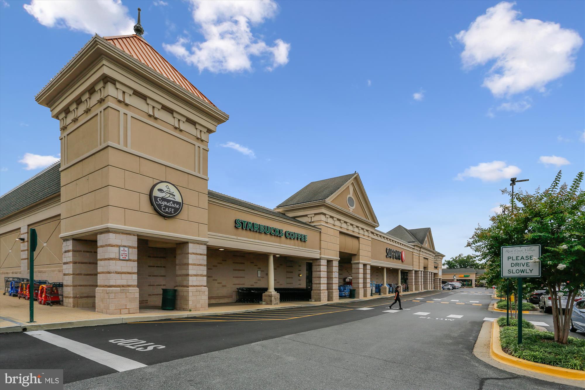 2517 Baltimore Road, Unit 25171 Rockville, MD 20853 - Photo 27 of 35 a front view of a building with streets and trees