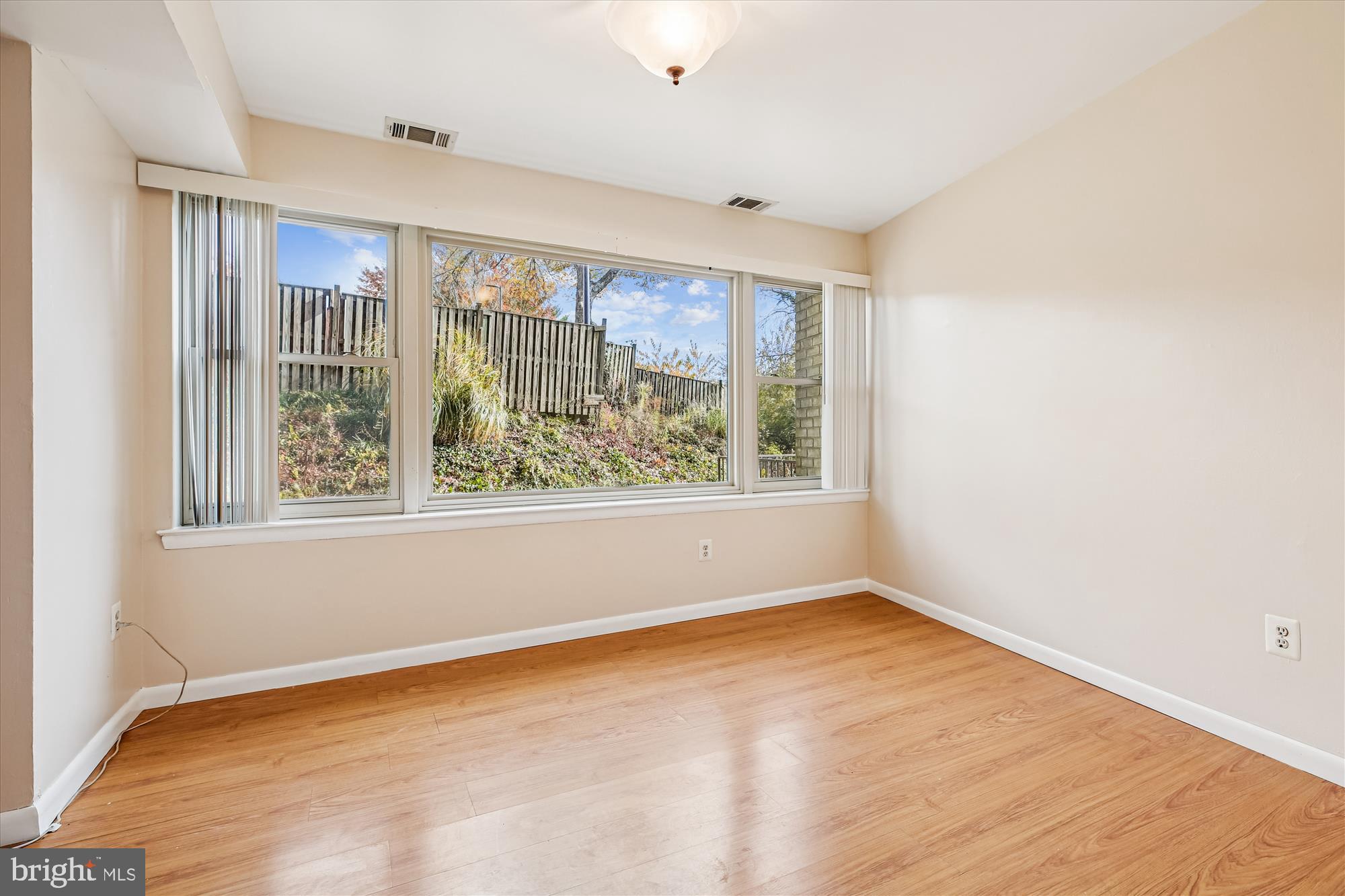 2517 Baltimore Road, Unit 25171 Rockville, MD 20853 - Photo 6 of 35 a view of an empty room with a window