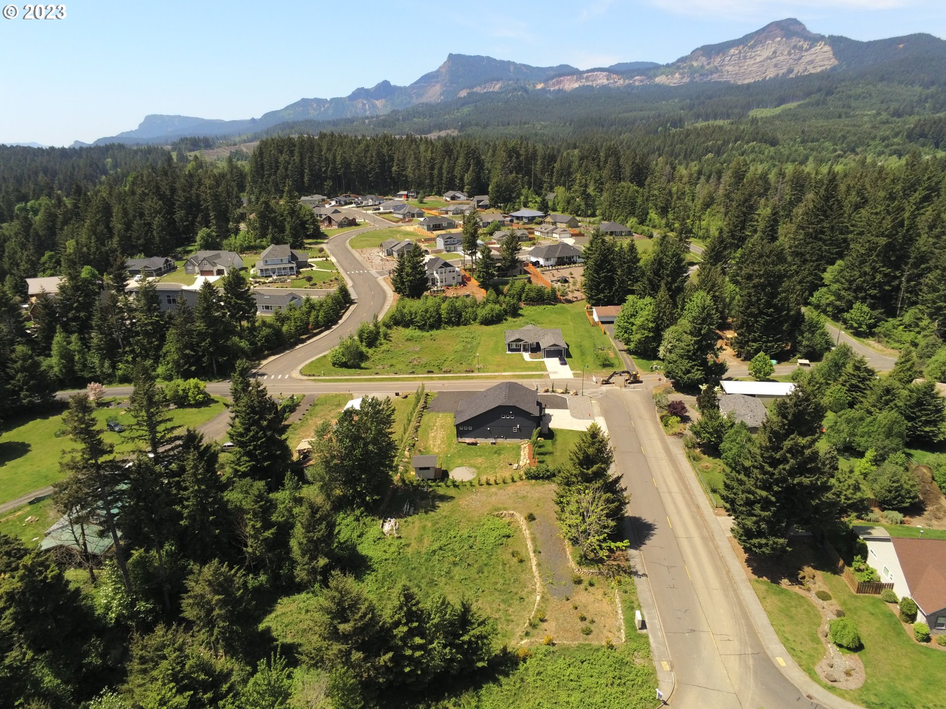 960 Northwest Angel Heights Road Stevenson, WA 98648 - Photo 2 of 12 a view of a house with a garden
