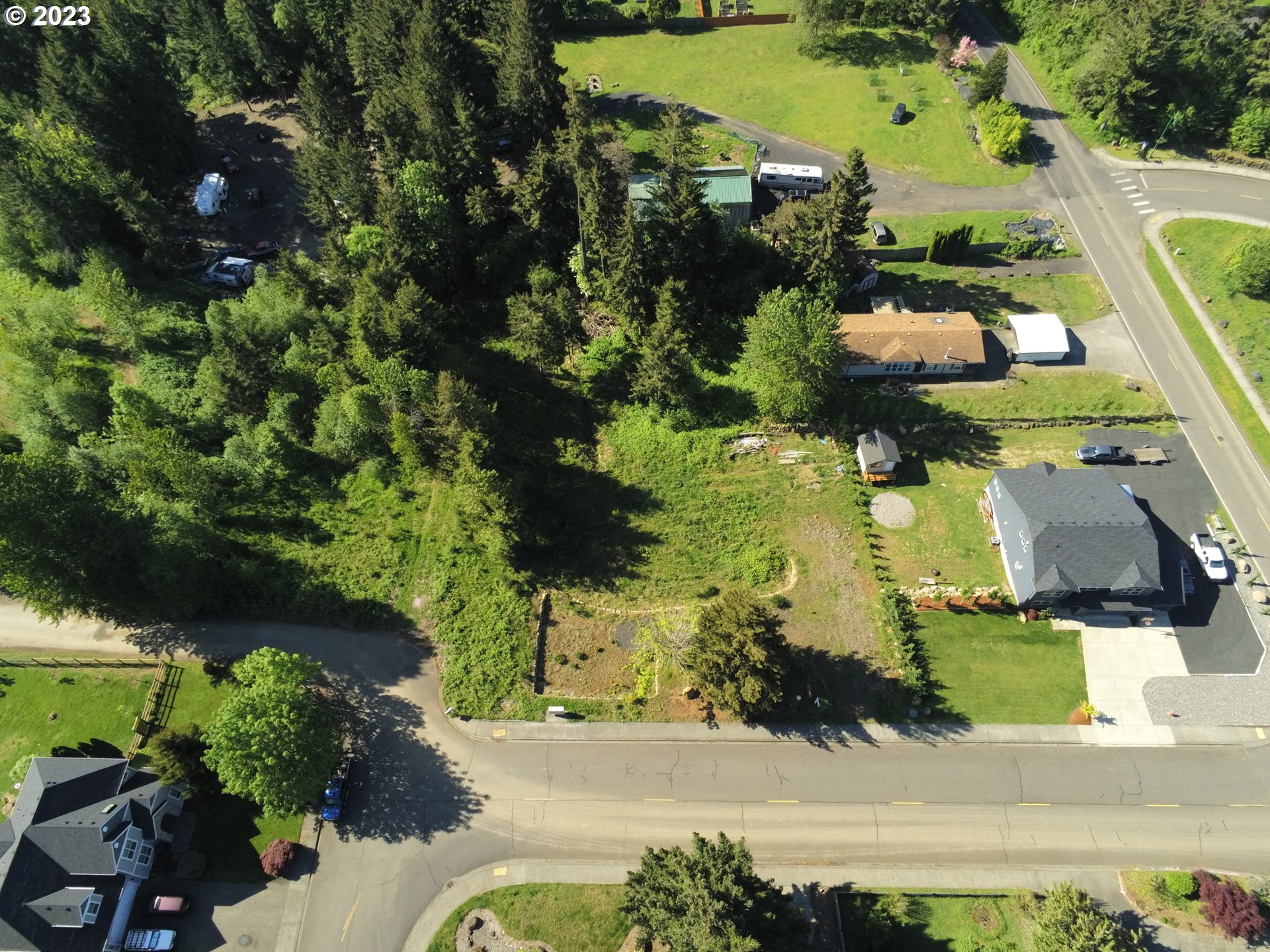 960 Northwest Angel Heights Road Stevenson, WA 98648 - Photo 9 of 12 an aerial view of a house with a yard basket ball court and outdoor seating