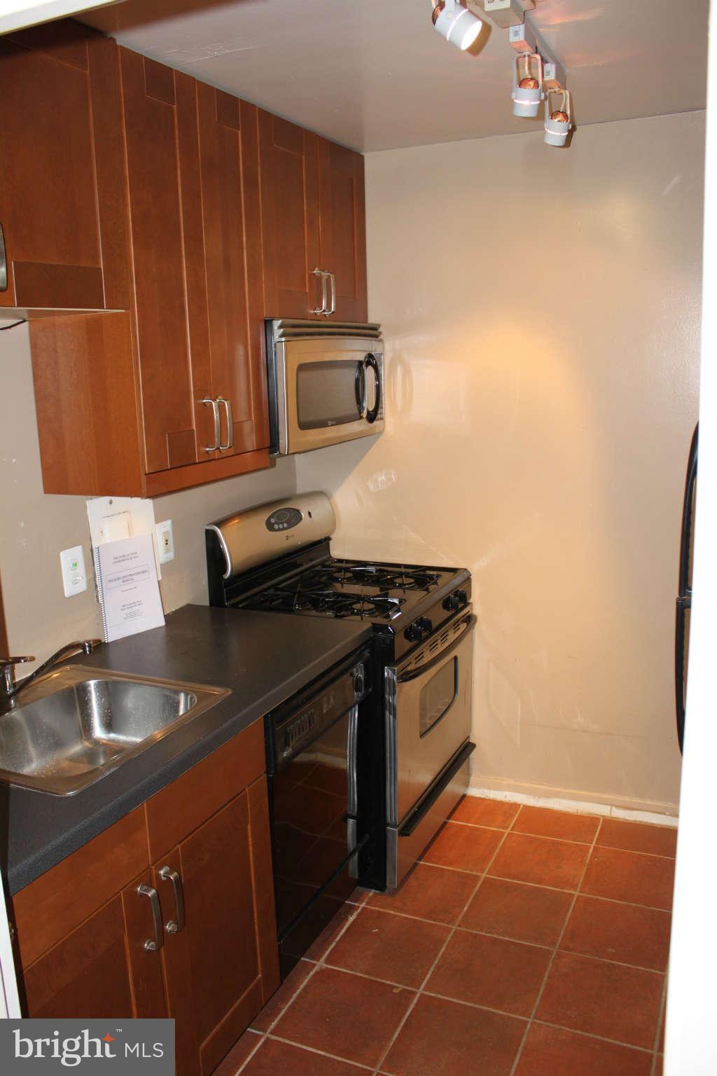 1900 Lyttonsville Road, Unit 802 Silver Spring, MD 20910 - Photo 3 of 15 Recently renovated kitchen since been repainted