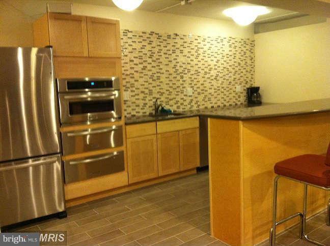 1900 Lyttonsville Road, Unit 802 Silver Spring, MD 20910 - Photo 9 of 15 Community kitchen