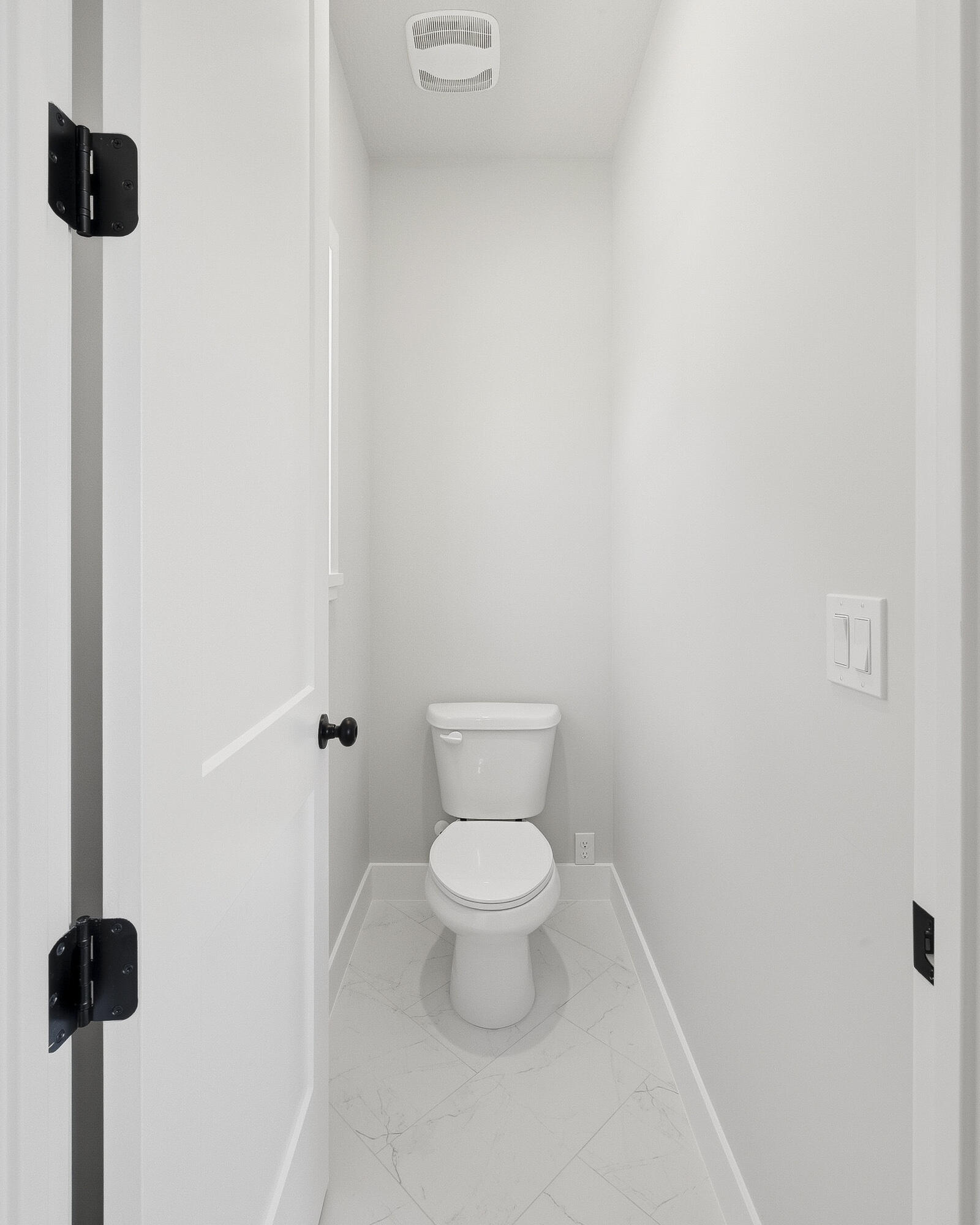 1852 South Hidden Canyon Road Cedar City, UT 84720 - Photo 26 of 79 A separate toilet room adds privacy and function to the primary bathroom.