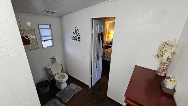 a bathroom with a sink and toilet