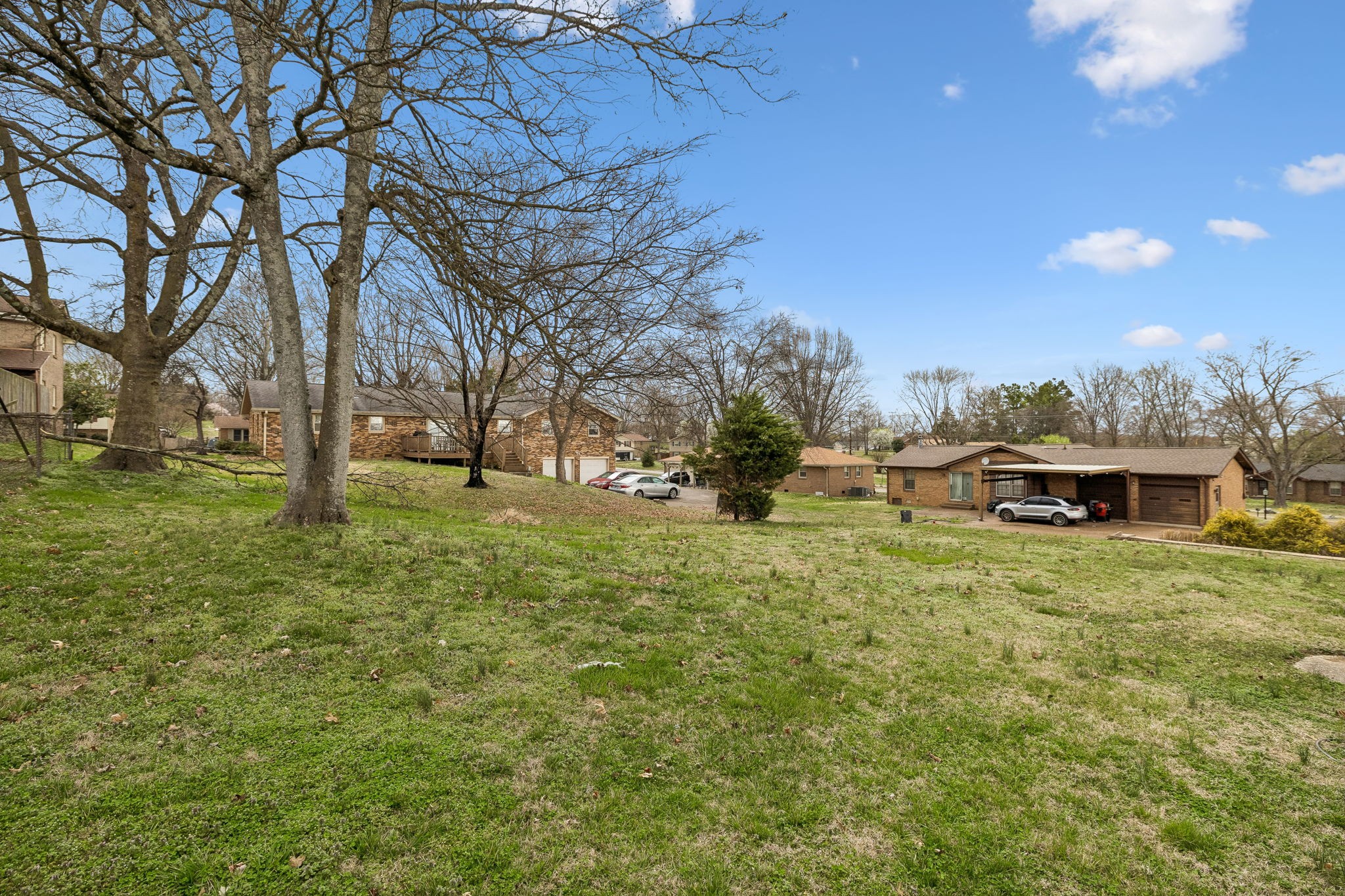 171 New Shackle Island Road Hendersonville, TN 37075 - Photo 42 of 48 a front view of a house with a yard