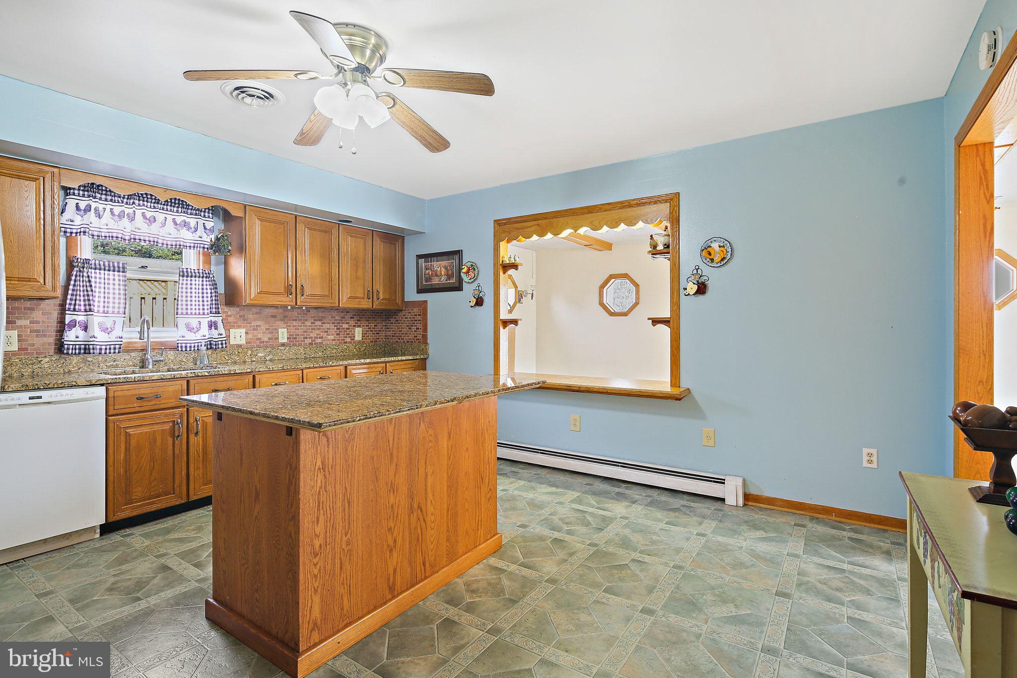 1025 St Michaels Road Mount Airy, MD 21771 - Photo 16 of 31 a view of kitchen with stainless steel appliances granite countertop cabinets and window