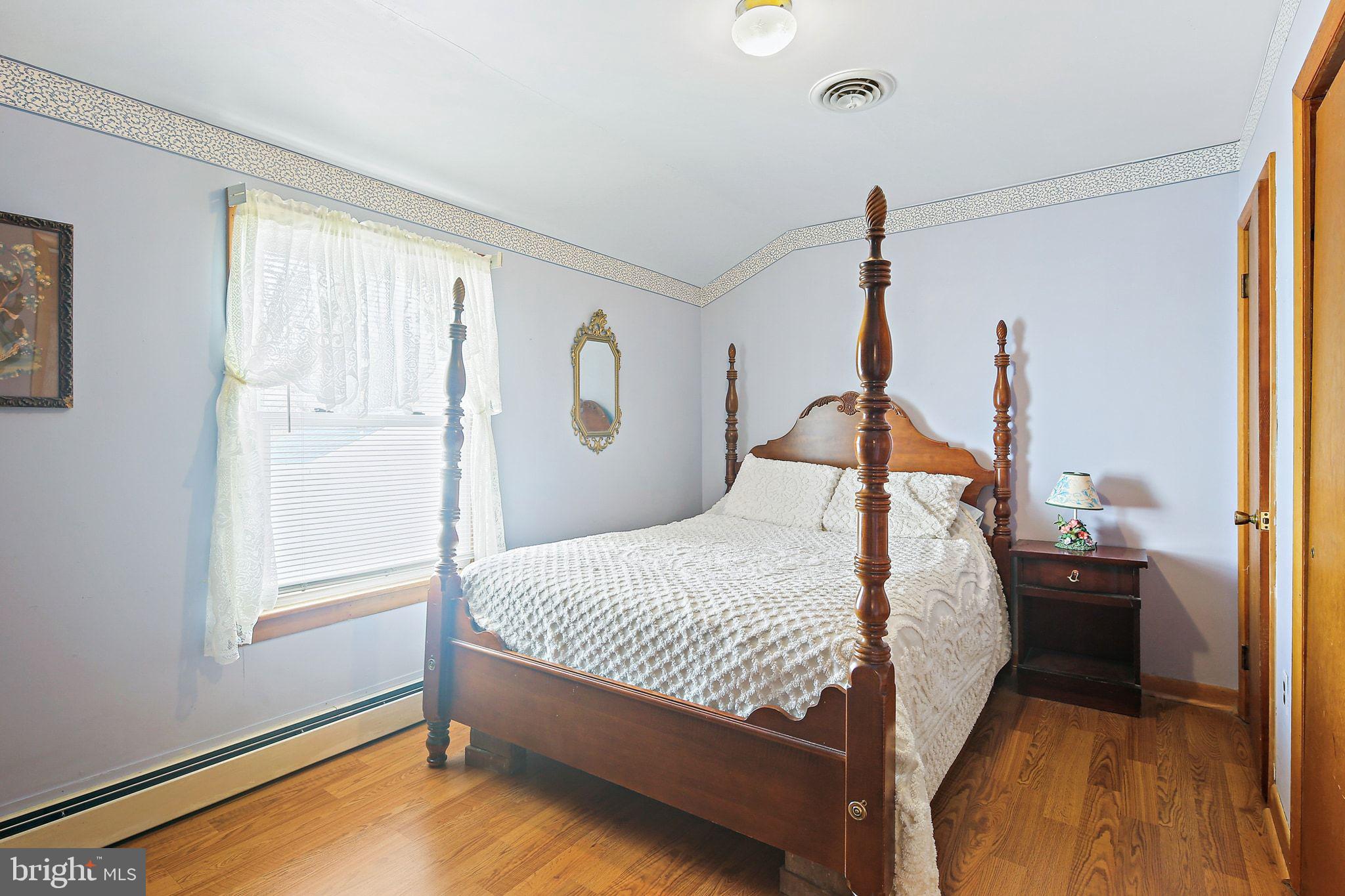 1025 St Michaels Road Mount Airy, MD 21771 - Photo 17 of 31 a bedroom with a bed and a window