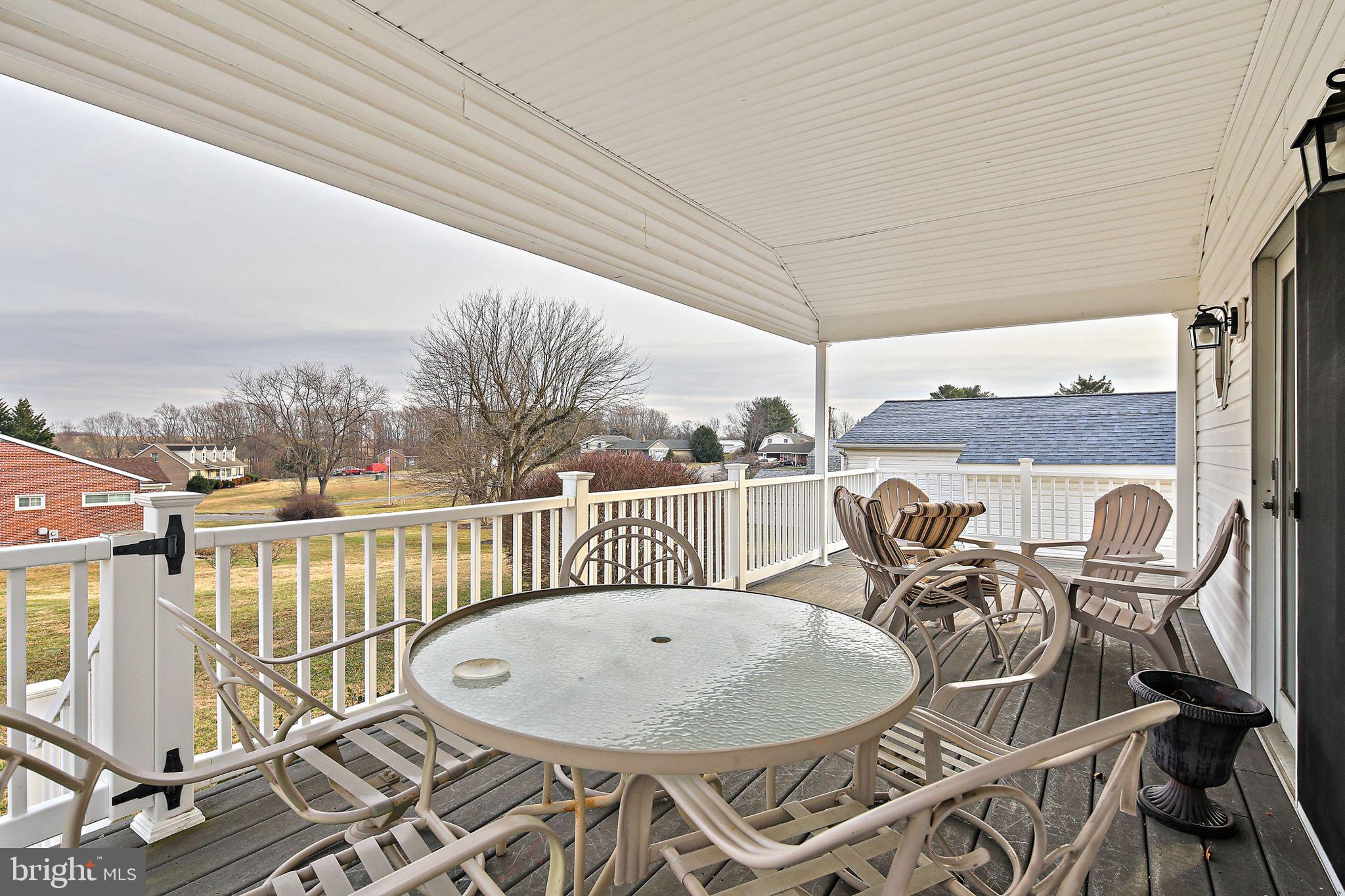 1025 St Michaels Road Mount Airy, MD 21771 - Photo 25 of 31 a view of a chairs and table in the balcony