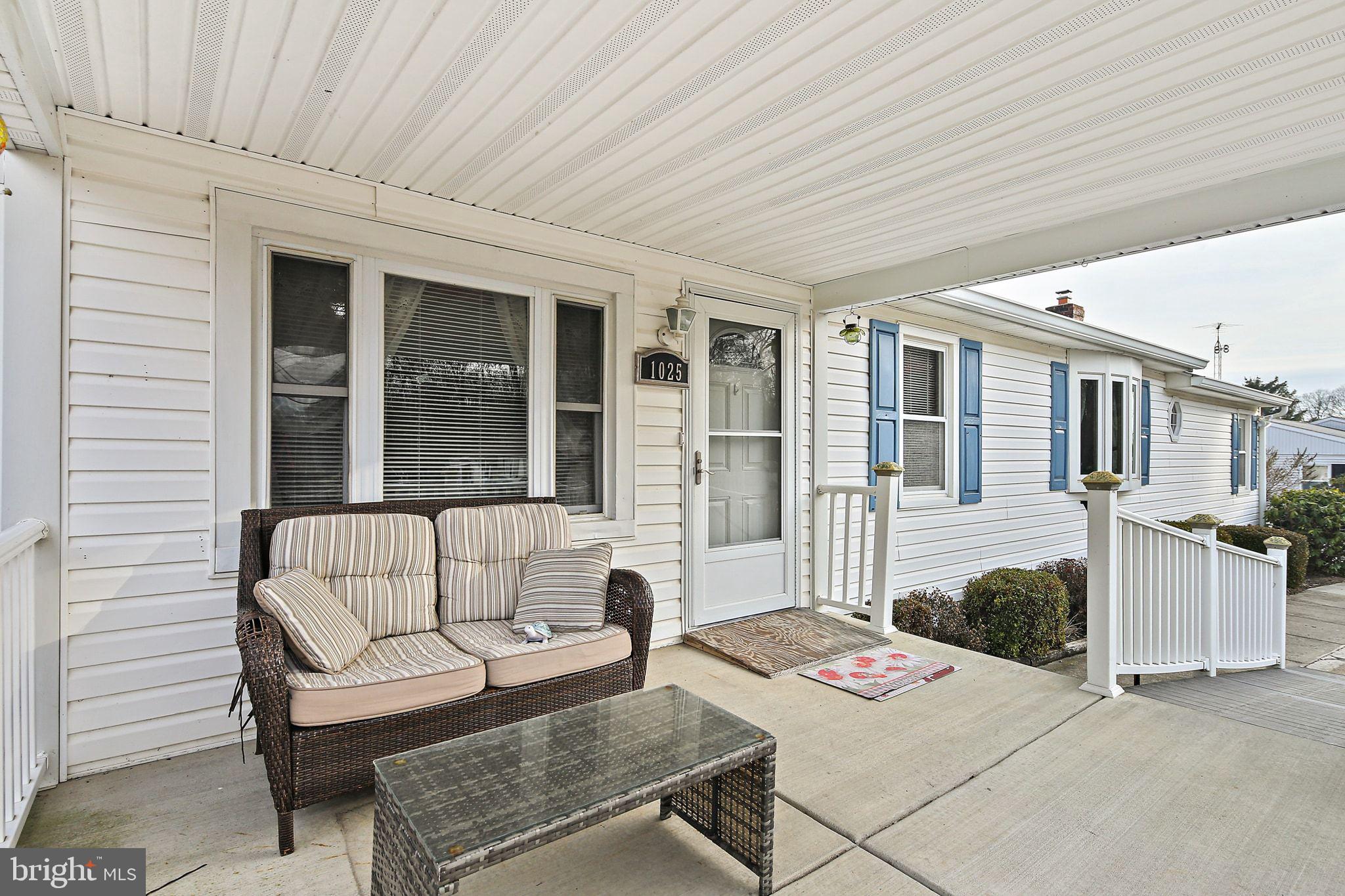 1025 St Michaels Road Mount Airy, MD 21771 - Photo 27 of 31 a outdoor living space with furniture and a potted plant