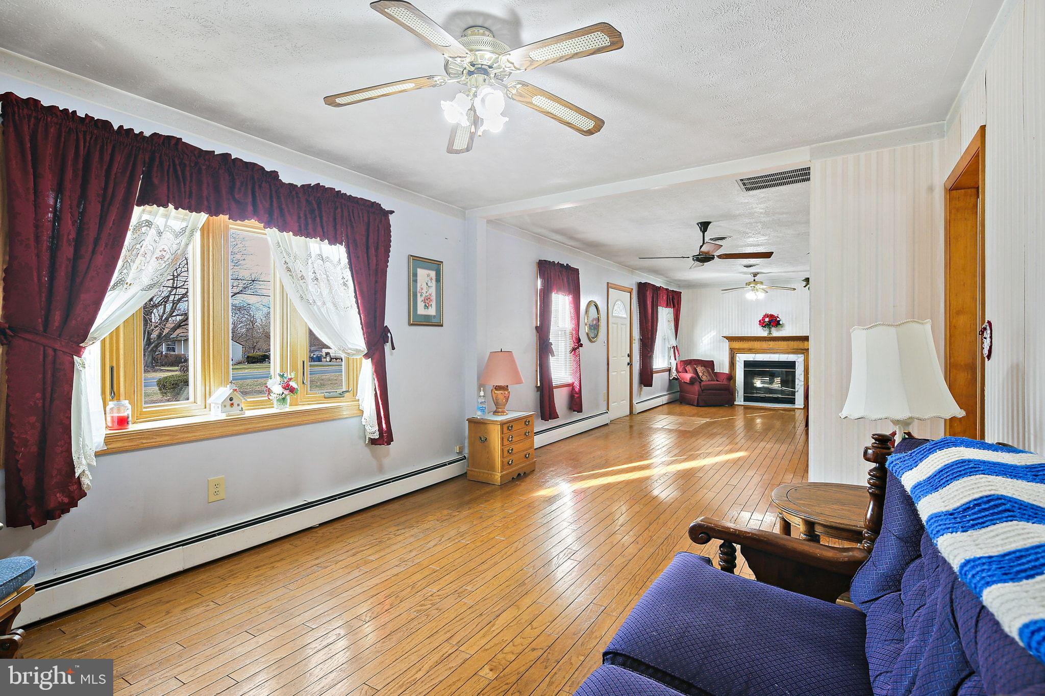 1025 St Michaels Road Mount Airy, MD 21771 - Photo 8 of 31 a room with furniture and a large window