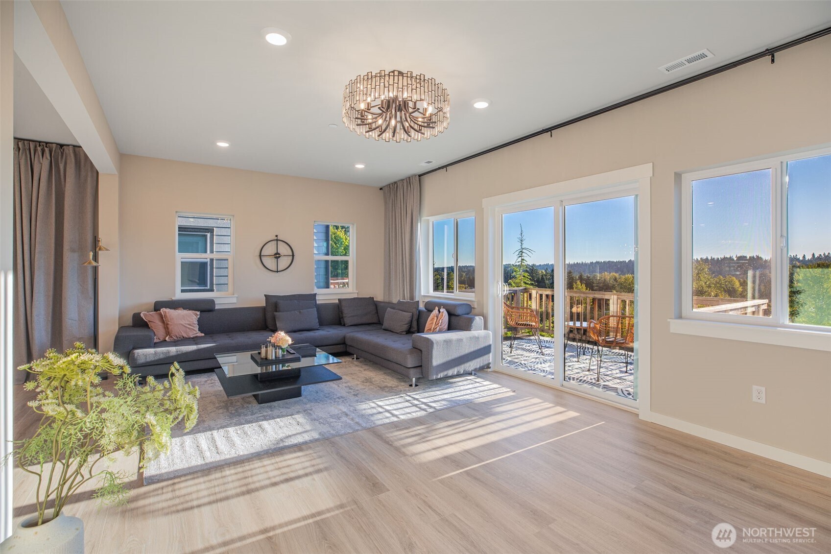1621 Seattle Hill Road, Unit EE1 Bothell, WA 98012 - Photo 11 of 39 a living room with furniture and a large window