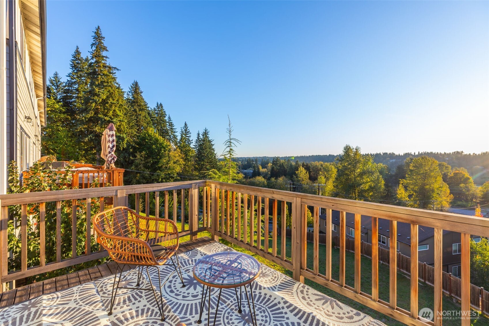 1621 Seattle Hill Road, Unit EE1 Bothell, WA 98012 - Photo 16 of 39 a view of a balcony with wooden floor and fence