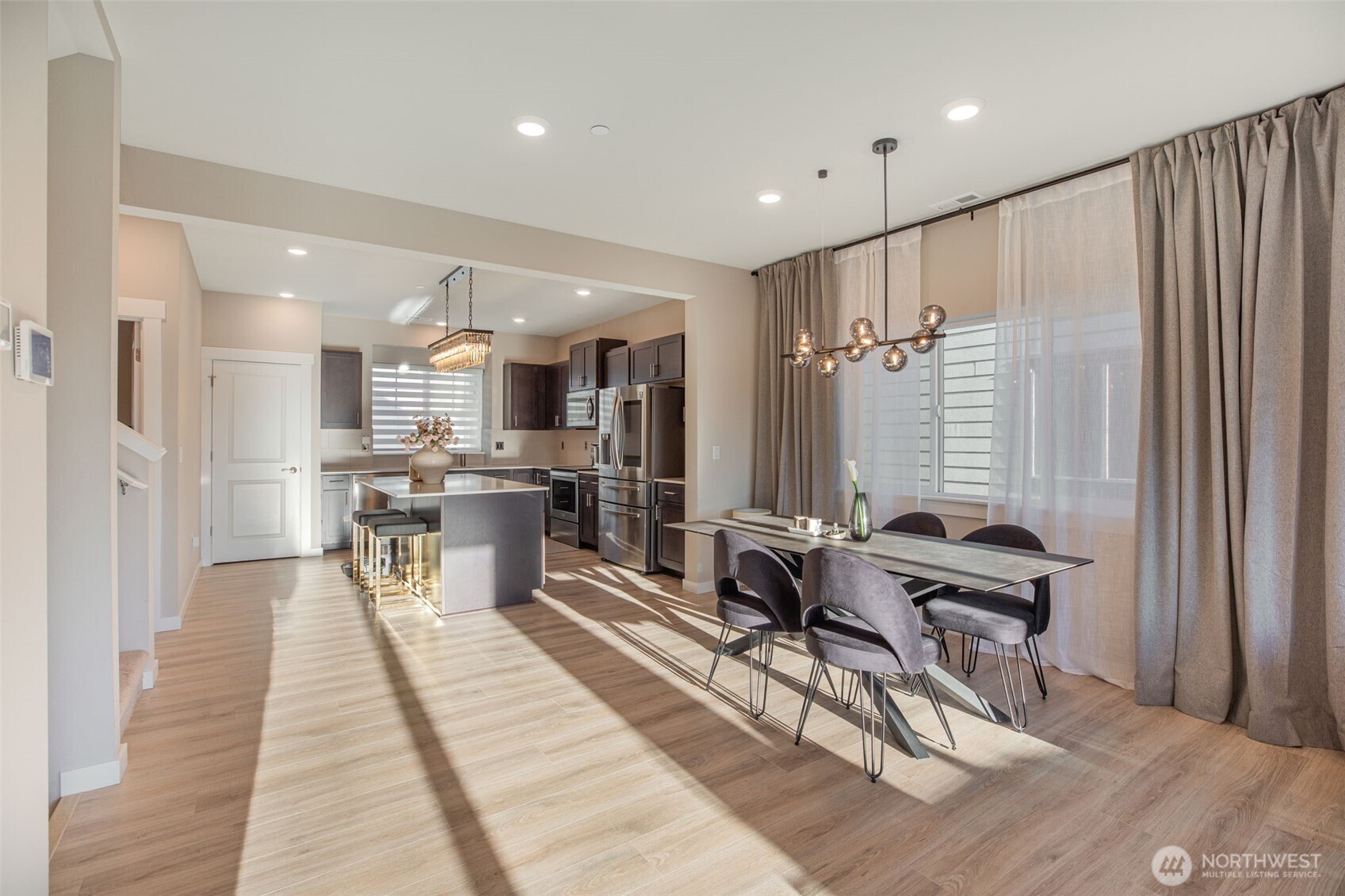 1621 Seattle Hill Road, Unit EE1 Bothell, WA 98012 - Photo 7 of 39 a living room with furniture and a large window