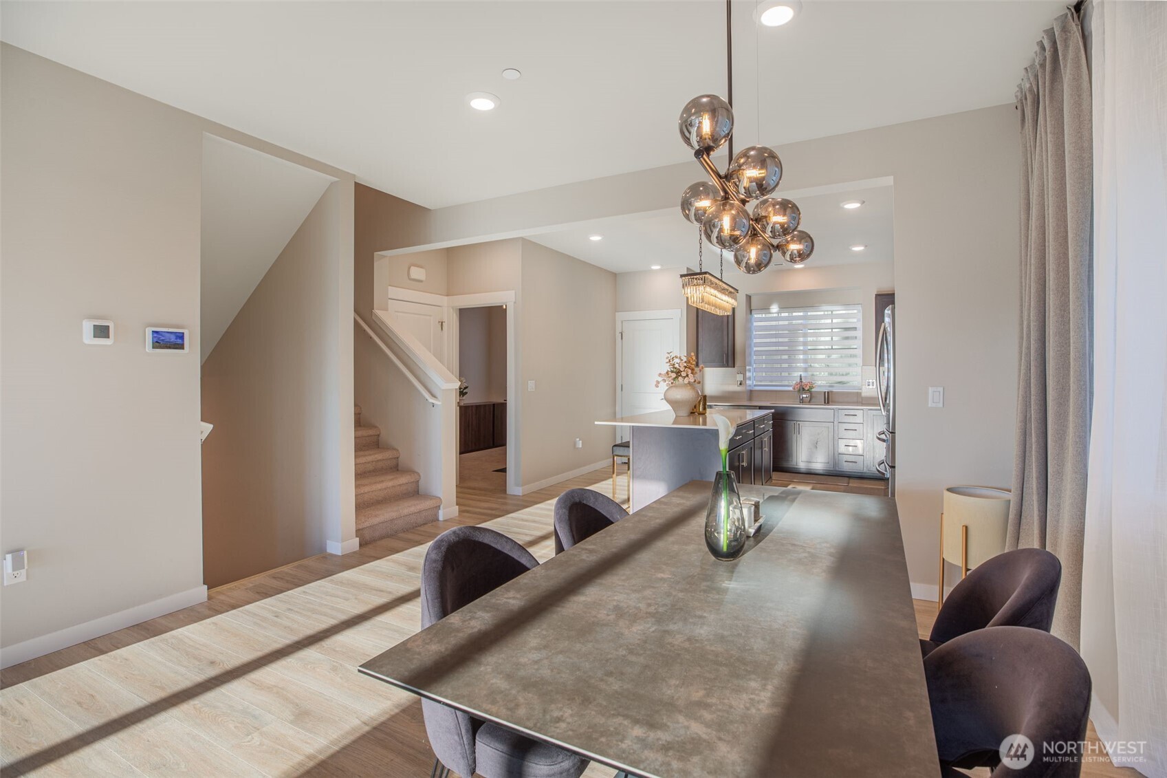 1621 Seattle Hill Road, Unit EE1 Bothell, WA 98012 - Photo 9 of 39 a living room with furniture and a chandelier