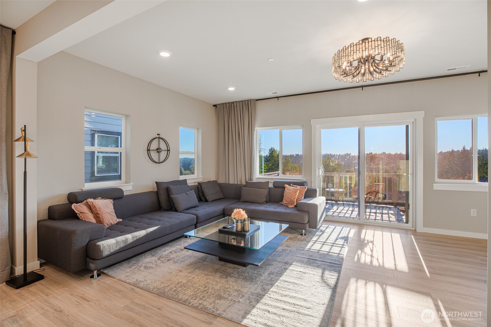 1621 Seattle Hill Road, Unit EE1 Bothell, WA 98012 - Photo 10 of 39 a living room with furniture and a large window