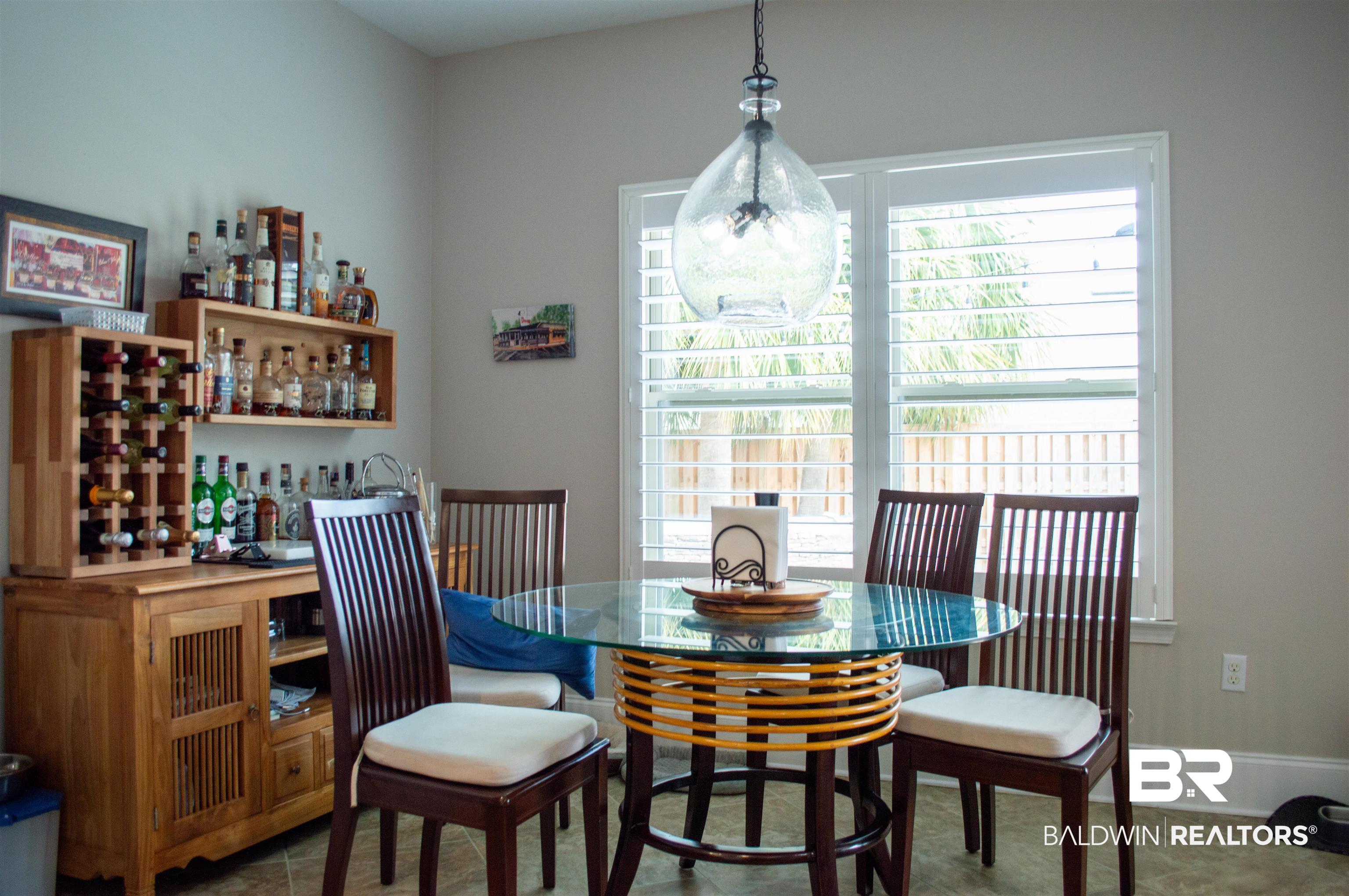 1124 West Orlando Drive Foley, AL 36535 - Photo 14 of 51 Dining space featuring baseboards