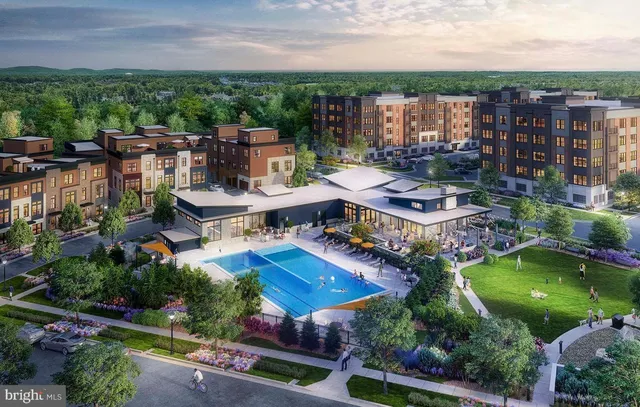 an aerial view of a house with swimming pool garden and patio