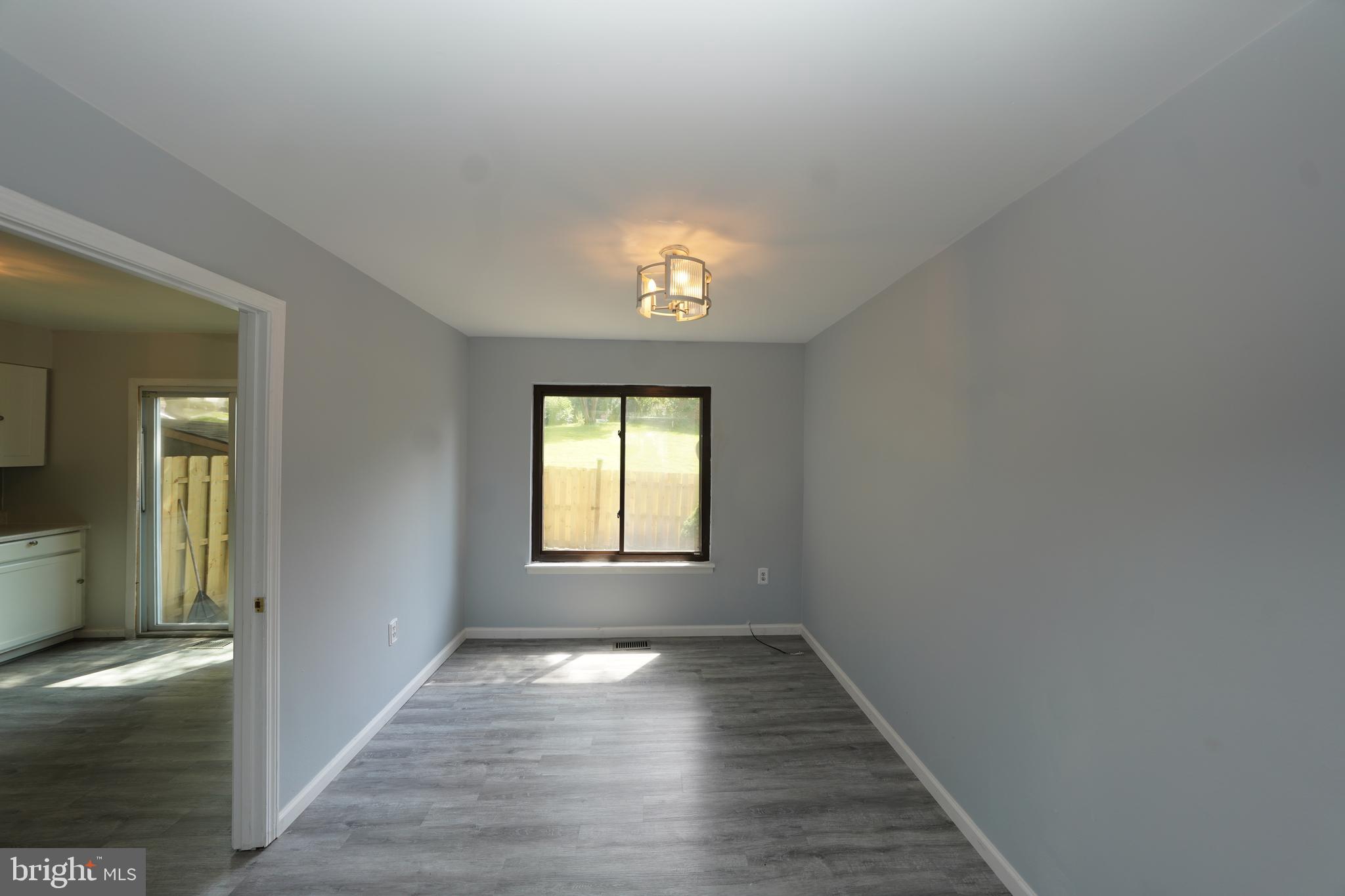 8997 Centerway Road Gaithersburg, MD 20879 - Photo 15 of 71 a view of an empty room and window