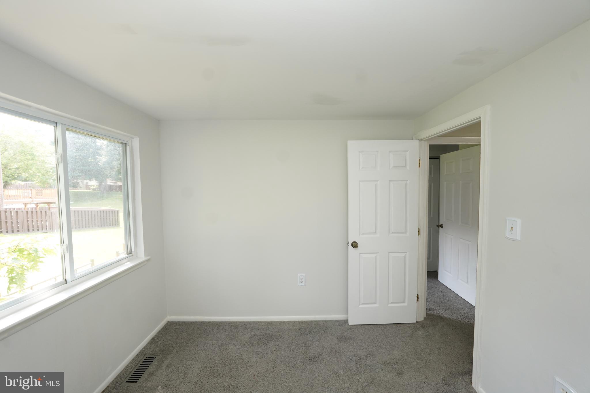 8997 Centerway Road Gaithersburg, MD 20879 - Photo 29 of 71 an empty room with a window