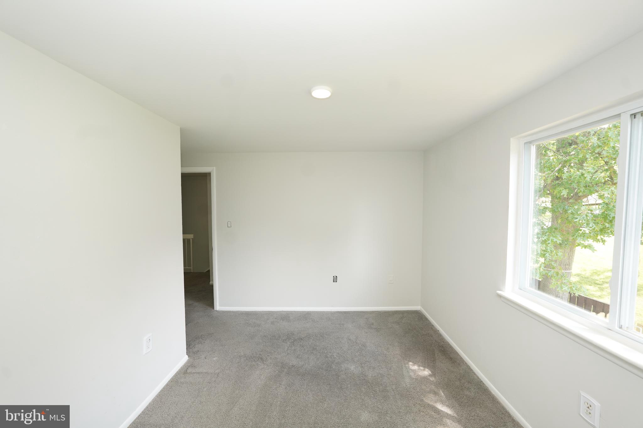 8997 Centerway Road Gaithersburg, MD 20879 - Photo 39 of 71 an empty room with a window