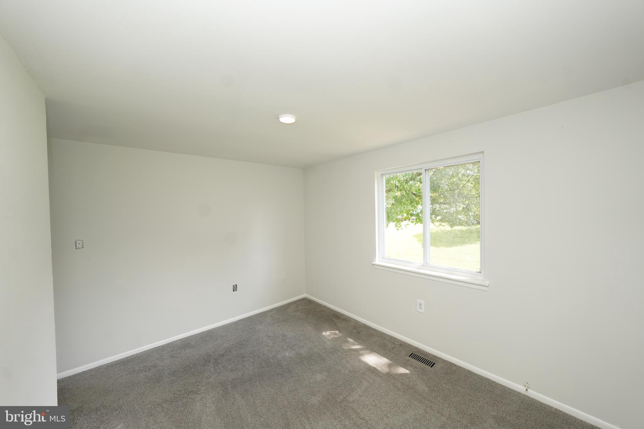 8997 Centerway Road Gaithersburg, MD 20879 - Photo 40 of 71 an empty room with a window