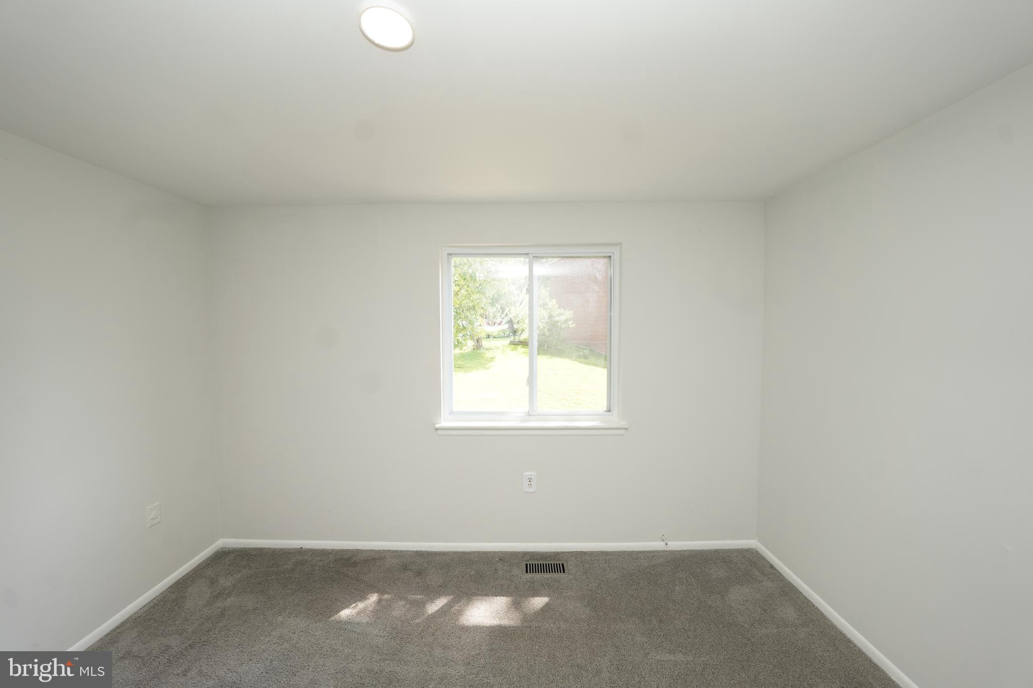 8997 Centerway Road Gaithersburg, MD 20879 - Photo 41 of 71 an empty room with a window