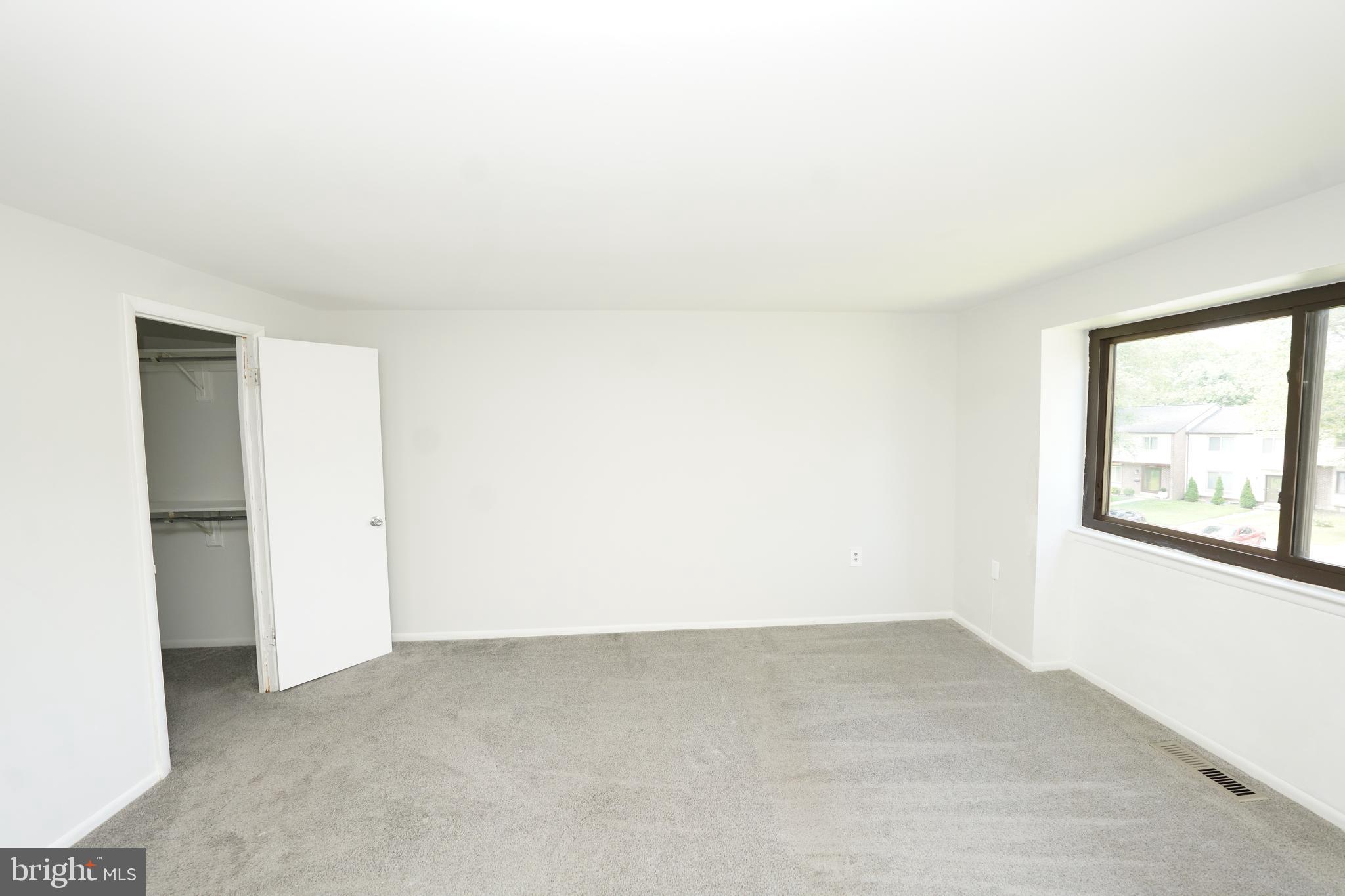 8997 Centerway Road Gaithersburg, MD 20879 - Photo 44 of 71 a view of a room that has a window in it