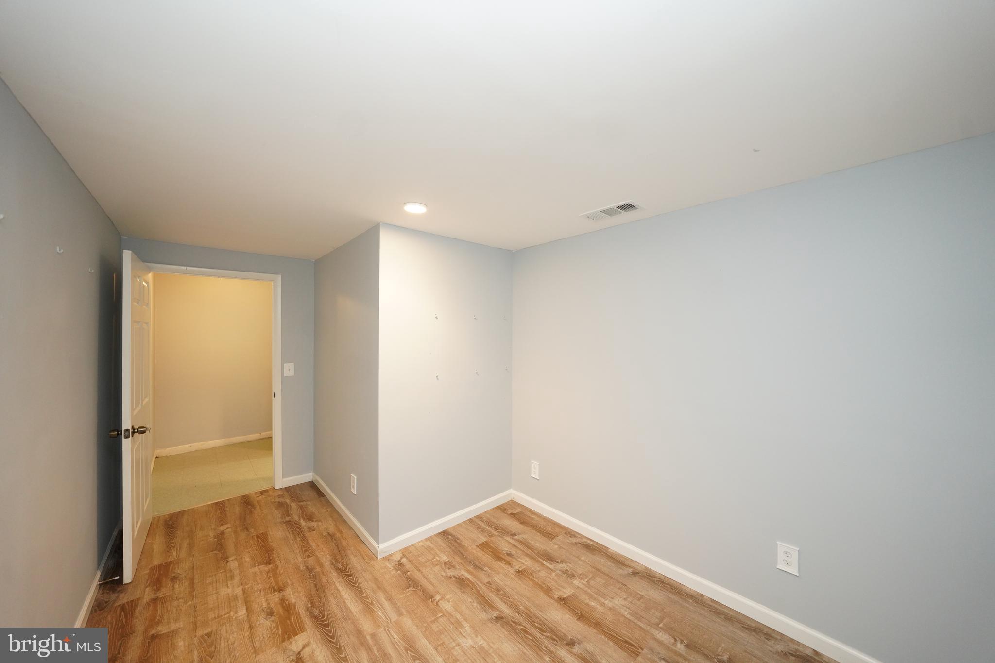 8997 Centerway Road Gaithersburg, MD 20879 - Photo 55 of 71 a view of an empty room and window