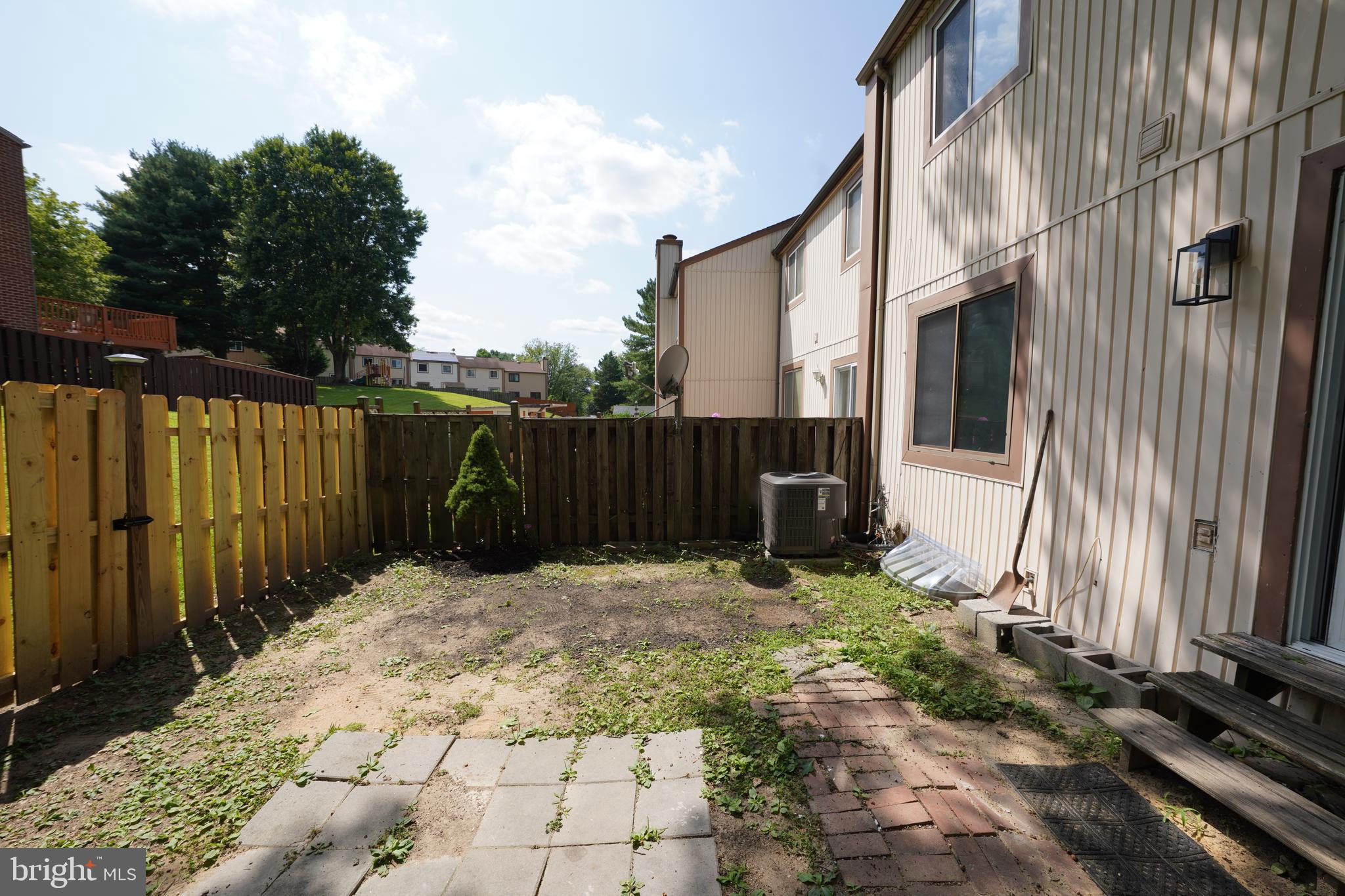8997 Centerway Road Gaithersburg, MD 20879 - Photo 69 of 71 a backyard of a house with lots of green space