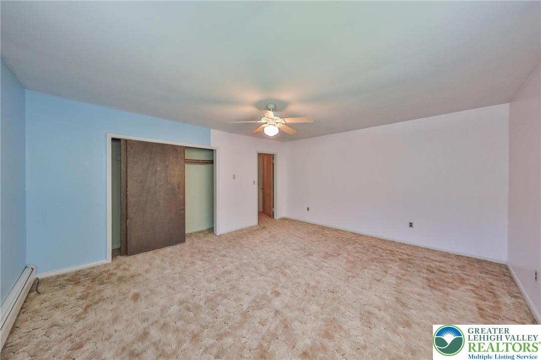 331 Cranberry Creek Road Cresco, PA 18326 - Photo 51 of 95 Comfortable bedroom with neutral carpeting and a convenient closet, awaiting your personal touch.