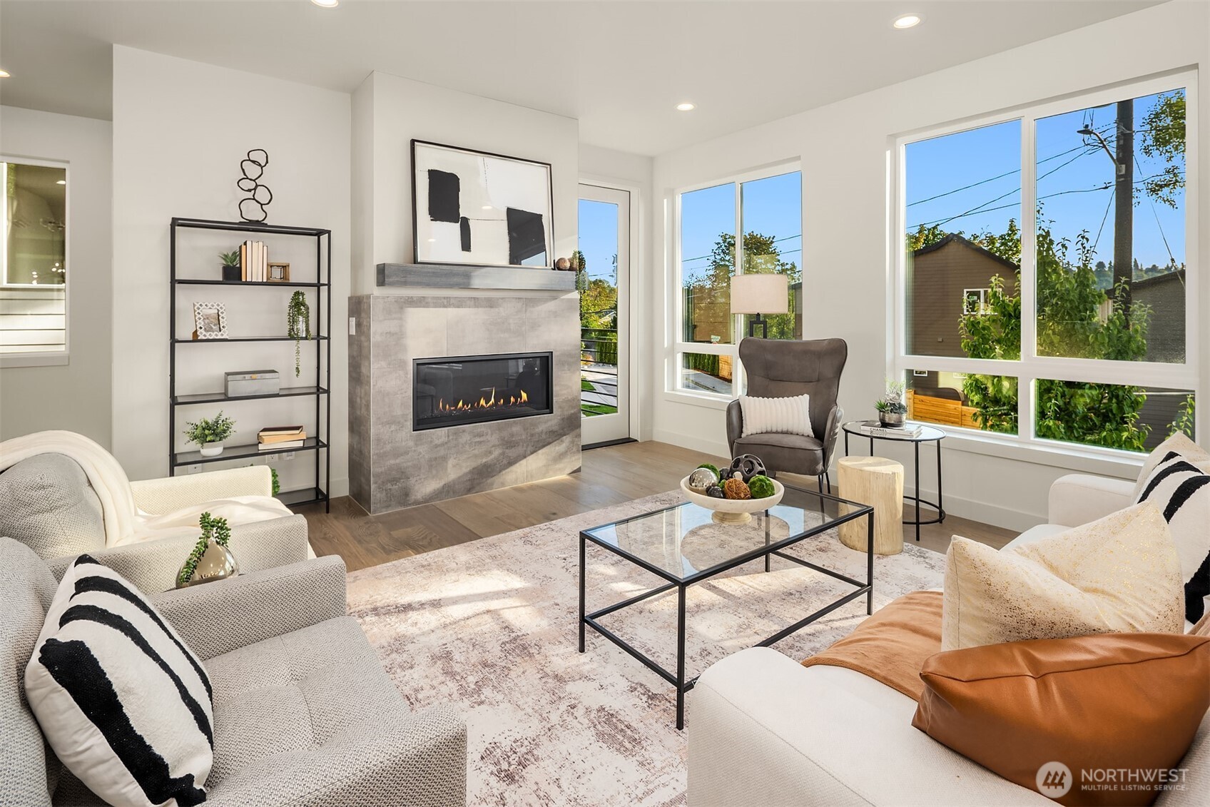 4572 22nd Avenue Southwest Seattle, WA 98106 - Photo 16 of 40 a living room with furniture and a fireplace