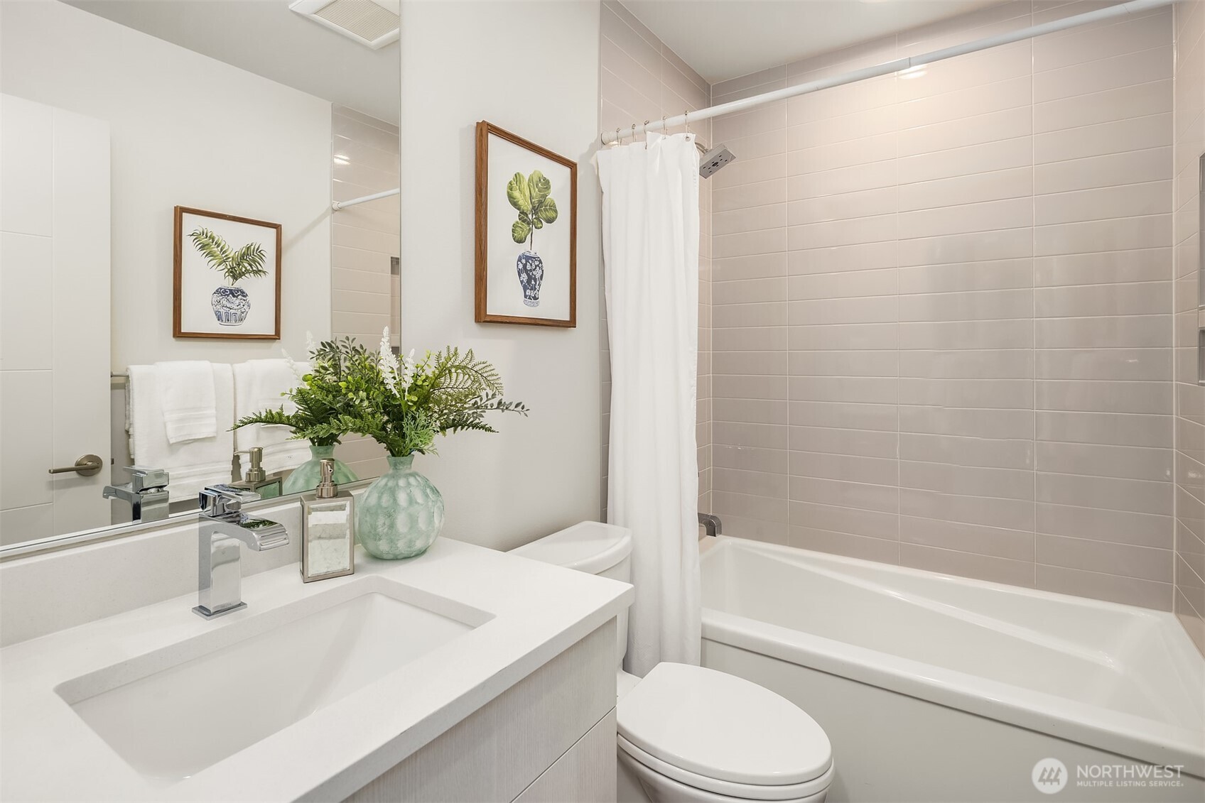 4572 22nd Avenue Southwest Seattle, WA 98106 - Photo 34 of 40 a bathroom with a sink toilet and shower