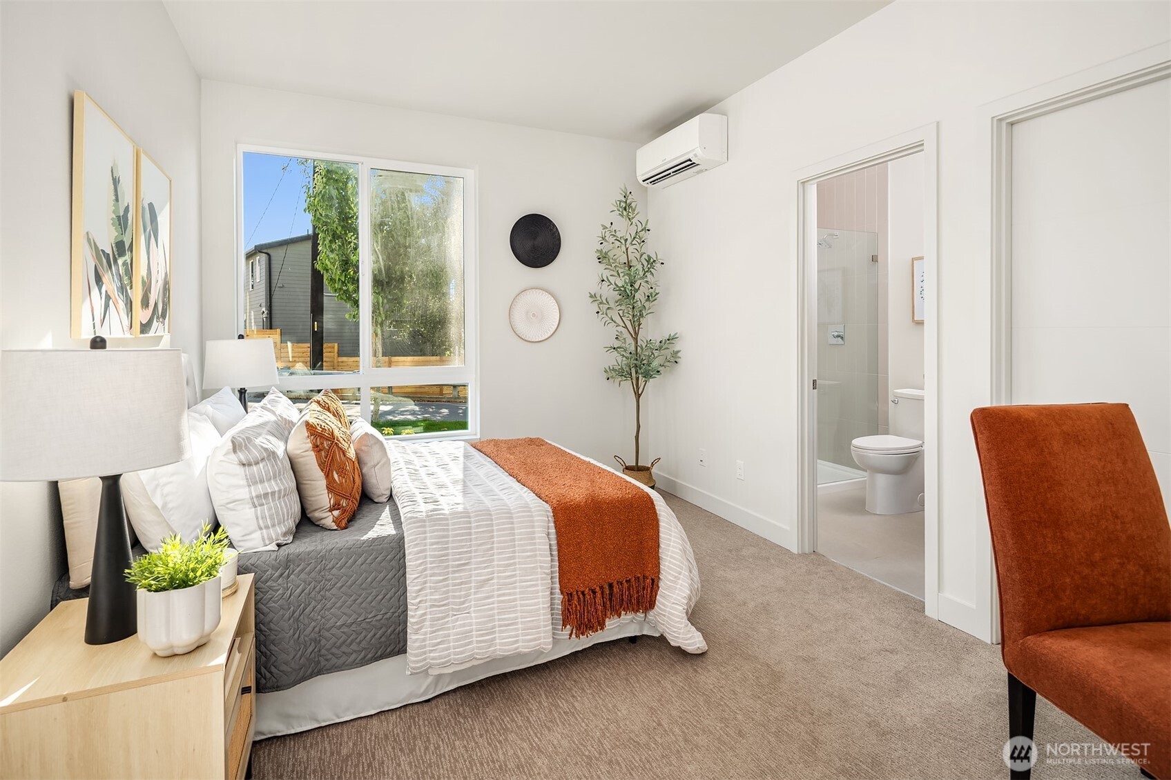 4572 22nd Avenue Southwest Seattle, WA 98106 - Photo 4 of 40 a bedroom with bed and wooden floor