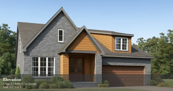 a front view of a house with garage