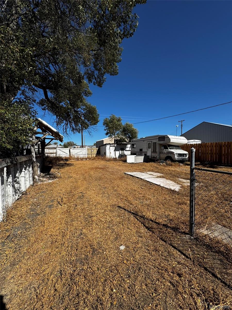 425 5th Street Hugo, CO 80821 - Photo 6 of 13 a view of street with view of building