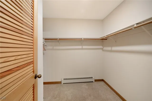 a view of a room with racks on the wall