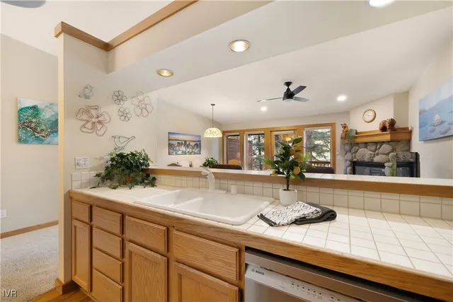 a kitchen with sink and window