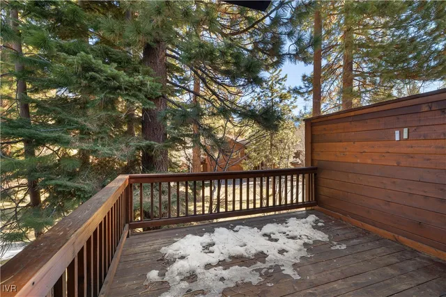 a view of wooden bench in a balcony