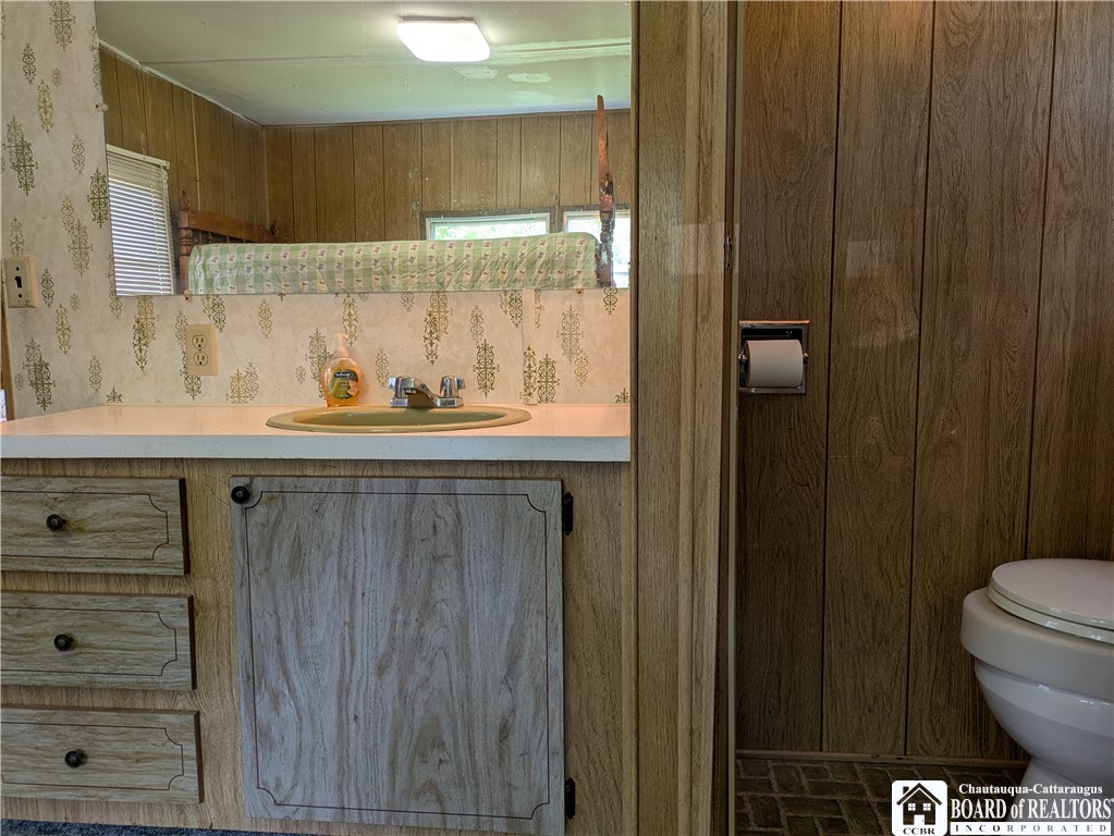 6 Burton Avenue Ripley, NY 14775 - Photo 13 of 25 Half bath with a sink in the bedroom, separate roo
