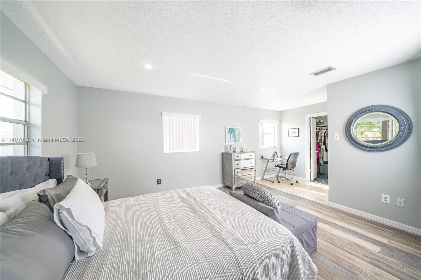 2403 Pasco Drive Sebring, FL 33870 - Photo 14 of 36 a bedroom with a bed and a window