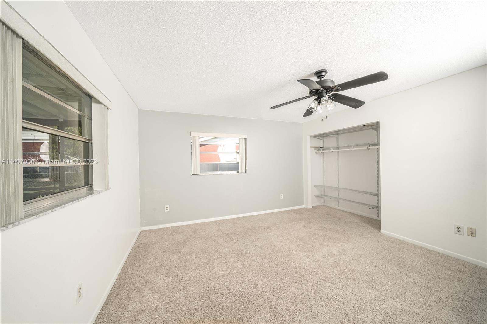 2403 Pasco Drive Sebring, FL 33870 - Photo 21 of 36 an empty room with a window and a fan