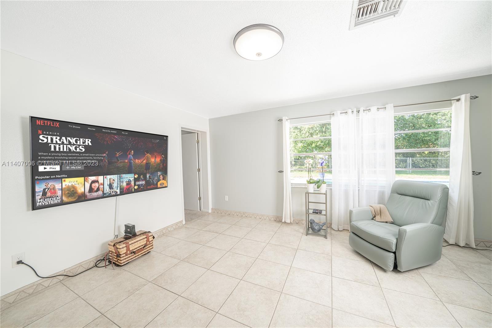 2403 Pasco Drive Sebring, FL 33870 - Photo 26 of 36 a room with furniture and a large window