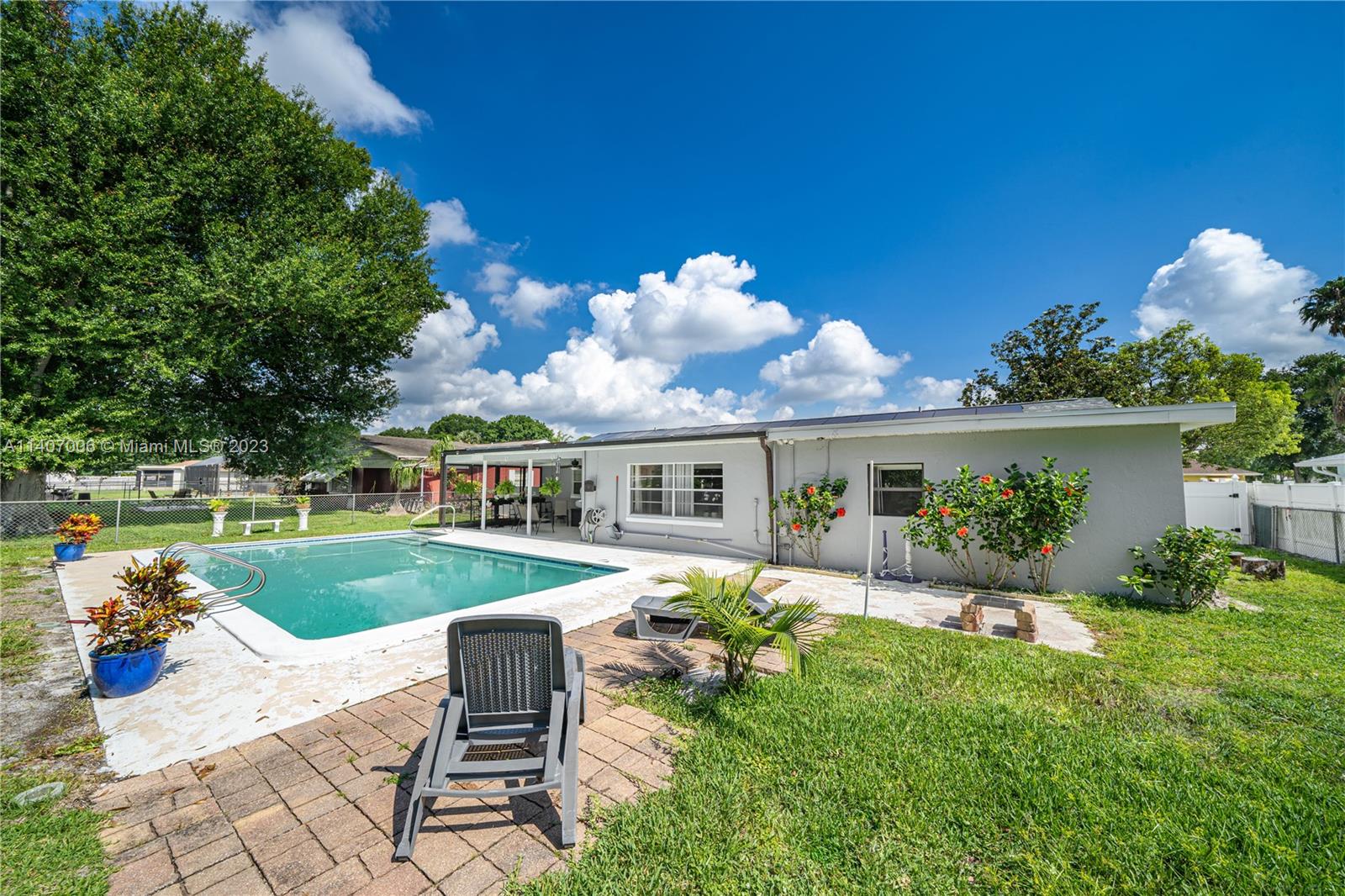 2403 Pasco Drive Sebring, FL 33870 - Photo 5 of 36 a view of a house with backyard sitting area and garden