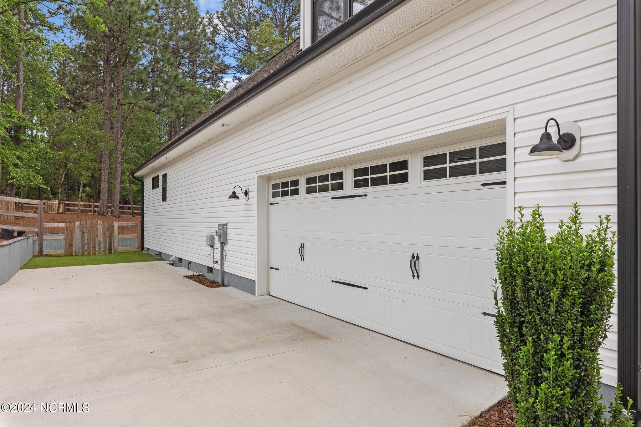 2 Buckhorn Road Jackson Springs, NC 27281 - Photo 48 of 56 Side entry garage & concrete that extends for additional parking