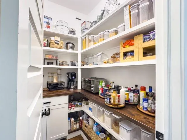 a room with storage and utility