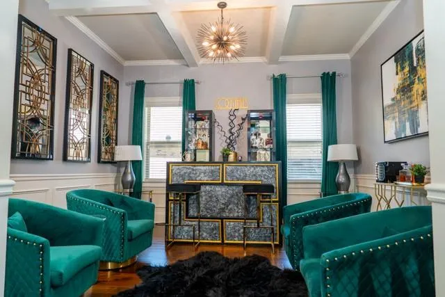 a living room with furniture and a fireplace