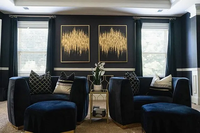 a living room with furniture and a window