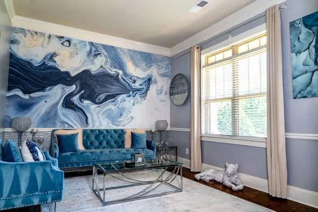 a living room with furniture and a window