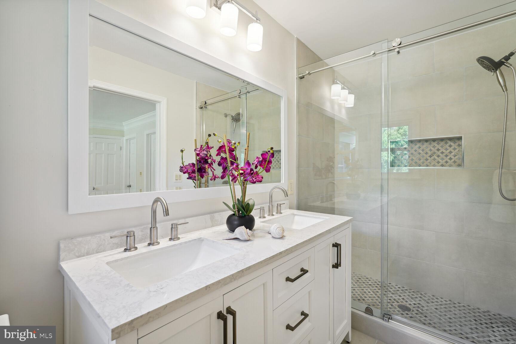 10511 South Glen Road Potomac, MD 20854 - Photo 18 of 44 Owners Bath with Frameless Glass Shower Stall