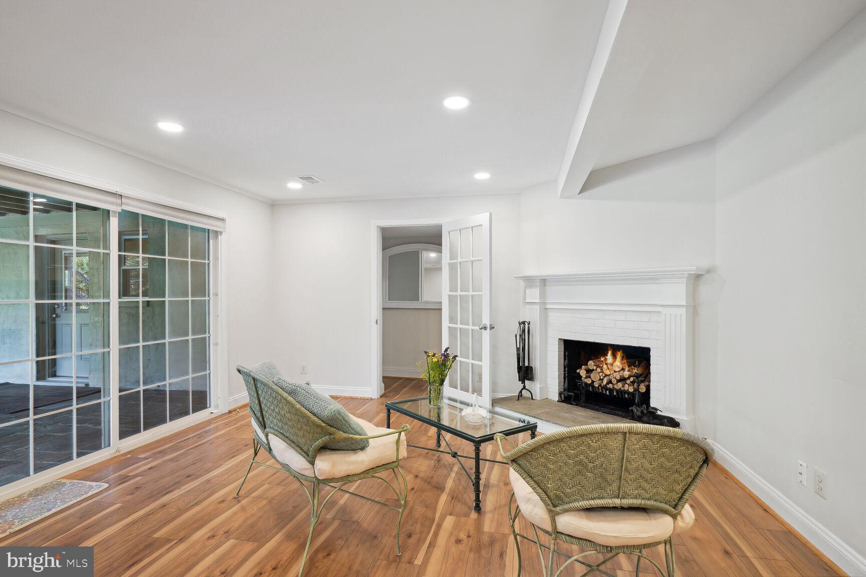 10511 South Glen Road Potomac, MD 20854 - Photo 28 of 44 Lower Level Sitting Area with Fireplace #3